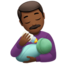 哺乳的男人: 中等 深肤色 — Apple